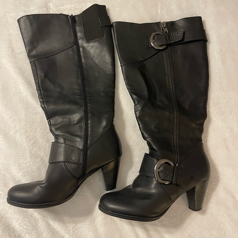 Tall, black boots with heel